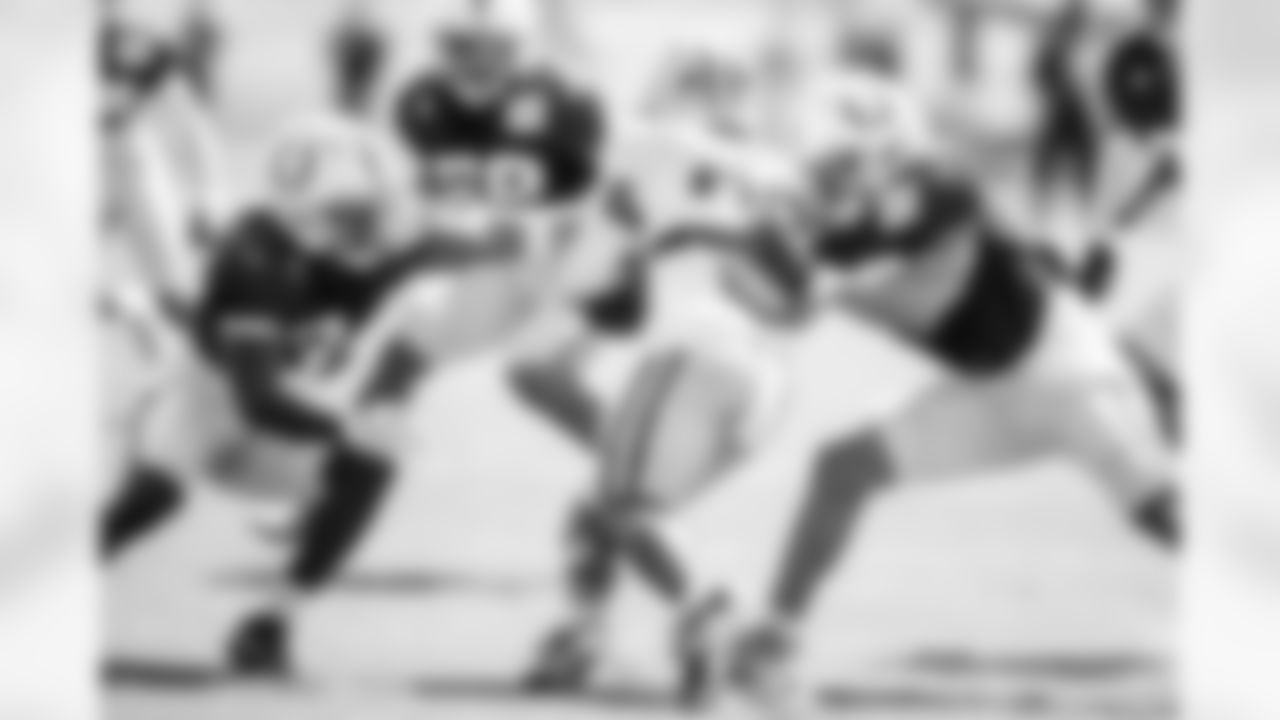 CB Duke Shelley #34 and S Daniel Scott #32