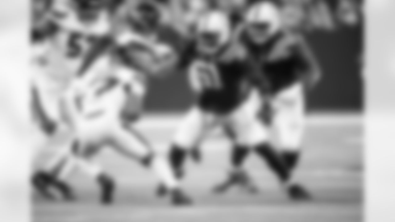 DE Kwity Paye #51 and DT Neville Gallimore #92