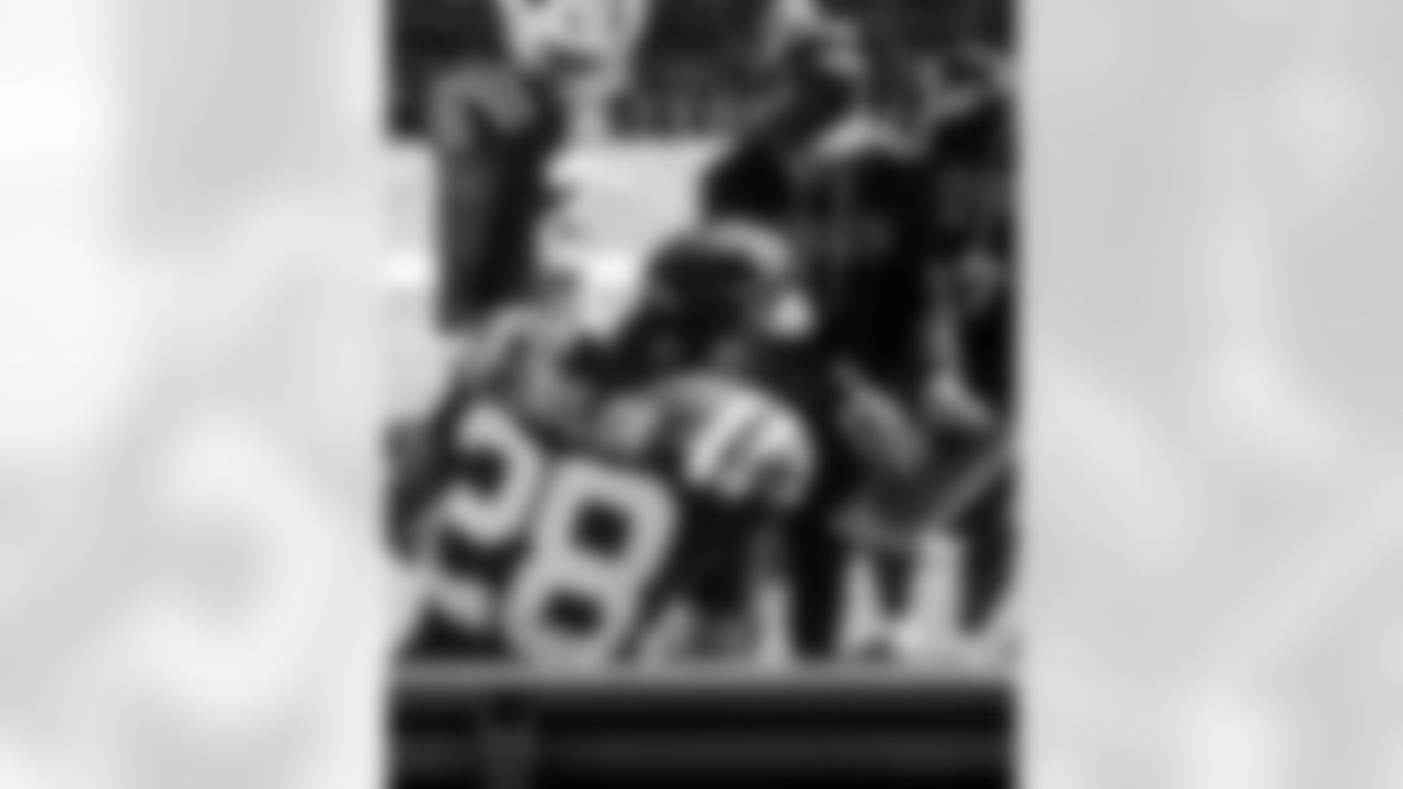 RB D.J. Giddens #21, RB Jonathan Taylor #28 and DeAndre Smith Running Backs