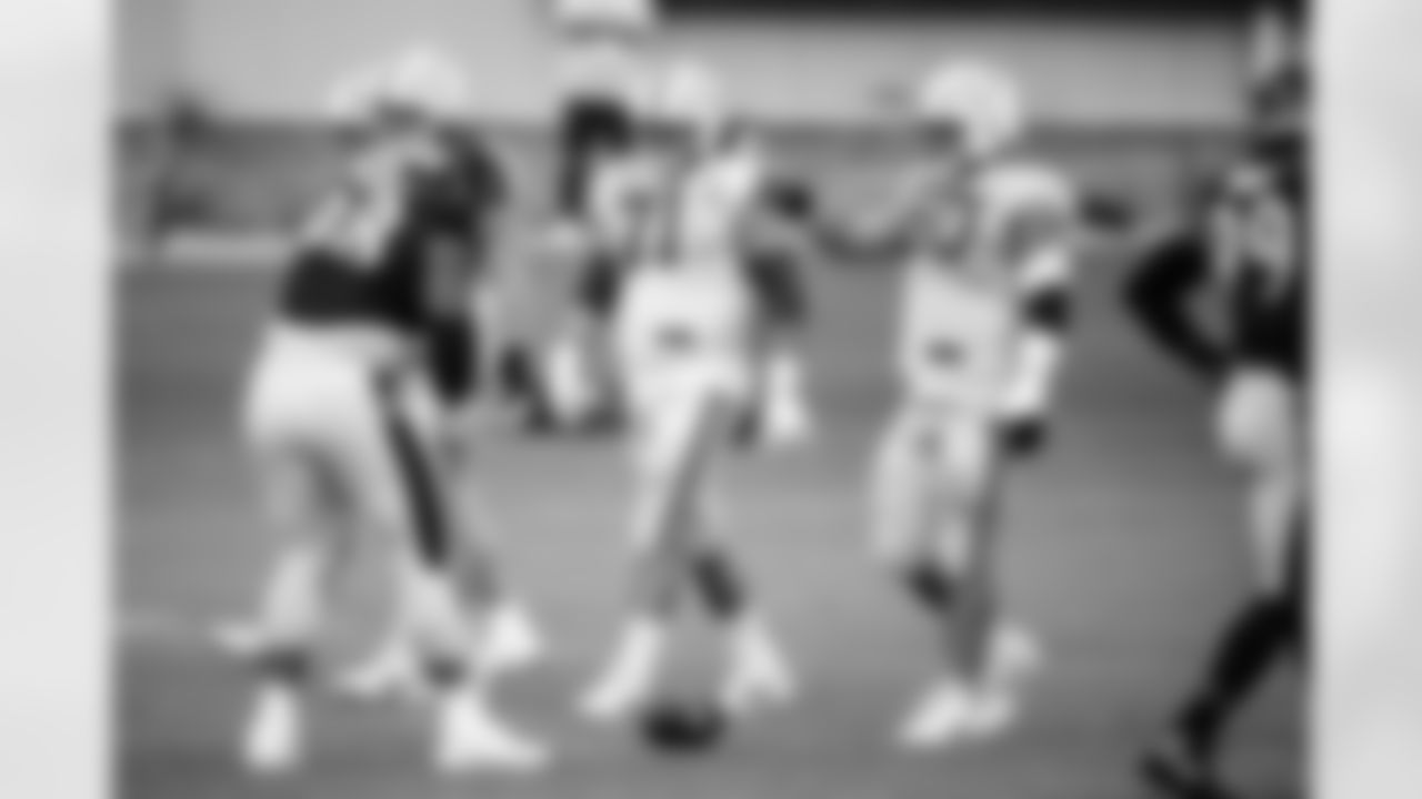 T Matt Goncalves #71 and G Tanor Bortolini #60