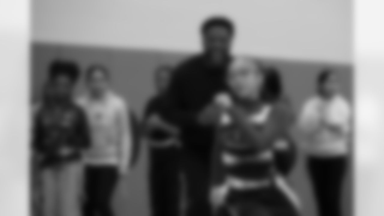 Colts linebacker Zaire Franklin cheers for a student participating in a drill during a GENYOUth clinic on Tuesday, Feb. 24, 2026, at Fall Creek Valley Middle School in Indianapolis. (Jerod Ringwald/AP Content Services for the NFL)