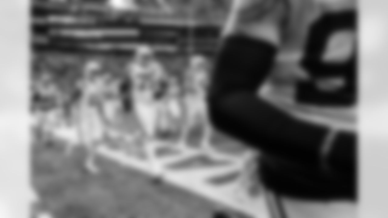 WR Michael Pittman Jr. #11, LB Austin Ajiake #58, T Jalen Travis #75 and G Tanor Bortolini #60