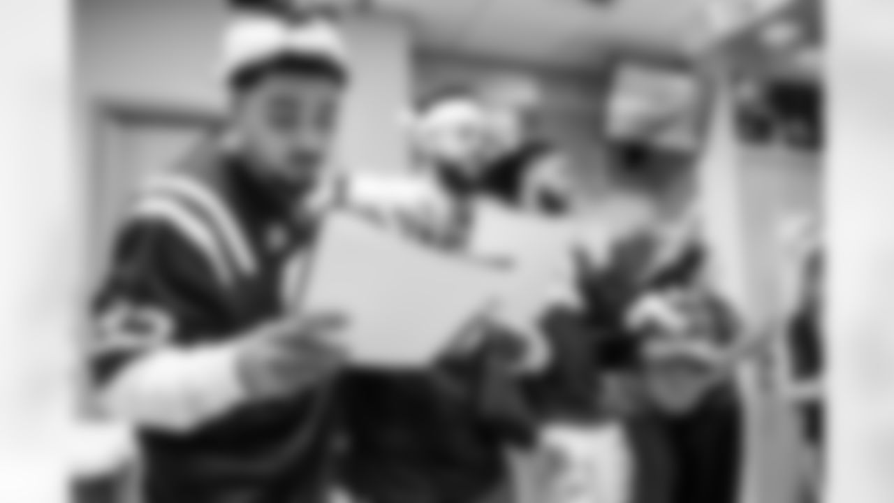 WR Eli Pancol #83 and LB Austin Ajiake #58