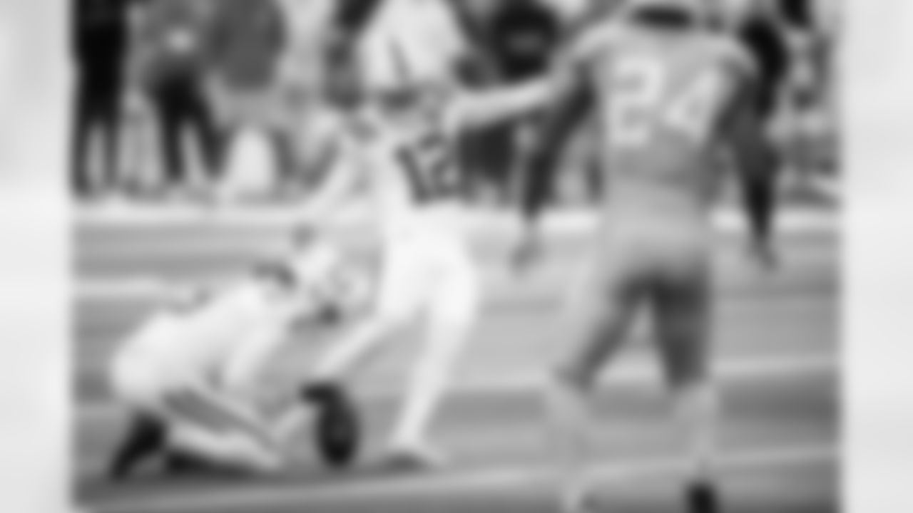 P Rigoberto Sanchez #8 and K Michael Badgley #12