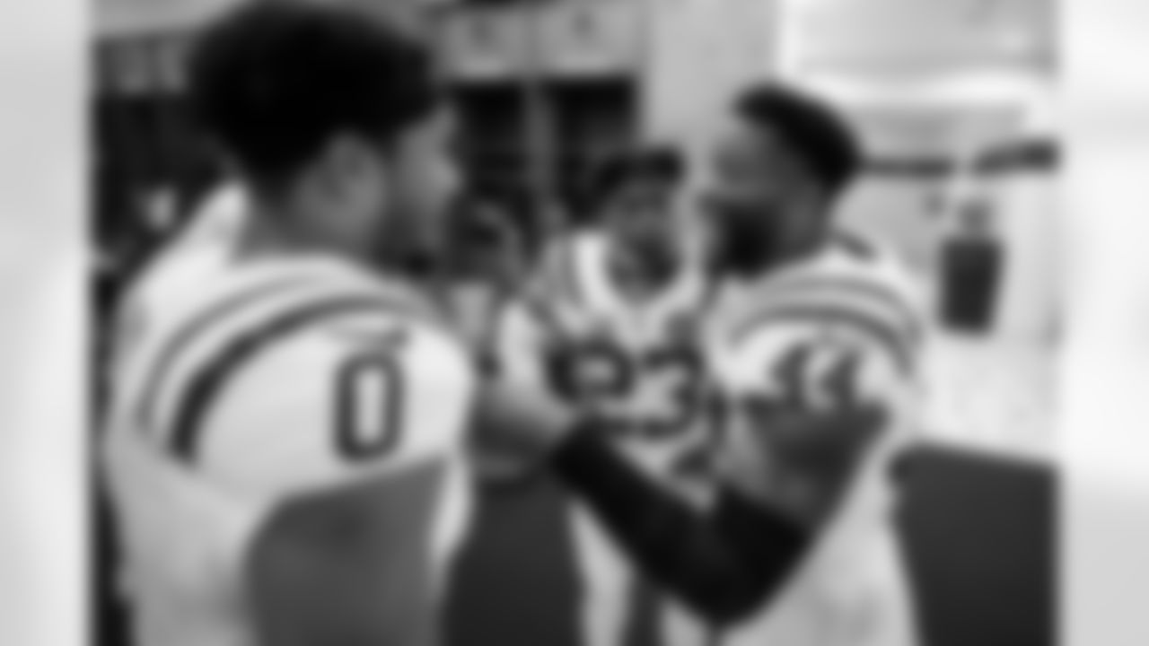 S Camryn Bynum #0, CB Kenny Moore II #23 and LB Zaire Franklin #44