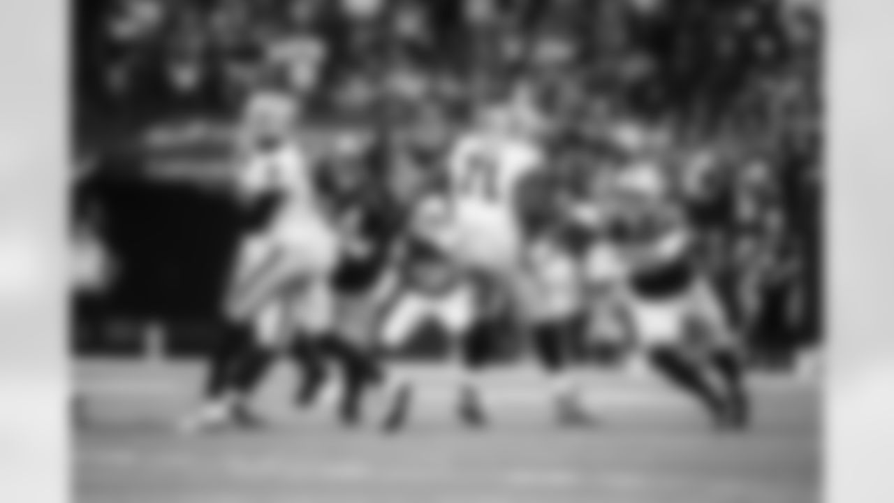 DE Laiatu Latu #97 and DE Tyquan Lewis #94