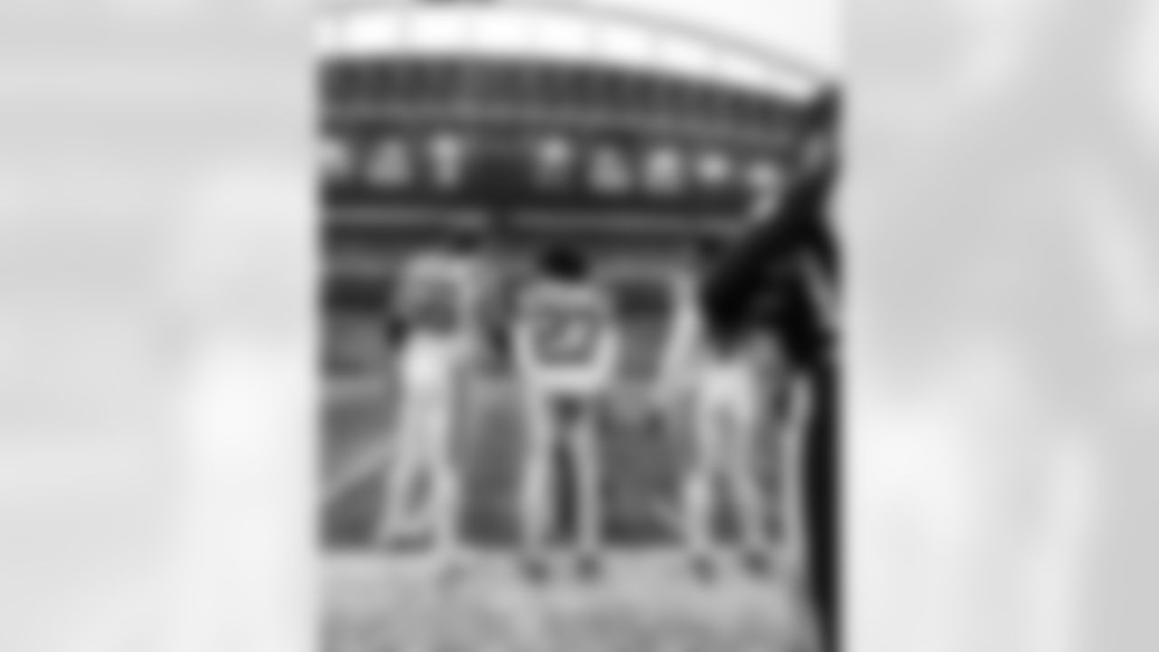 G Quenton Nelson #56, CB Kenny Moore II #23 and LB Zaire Franklin #44