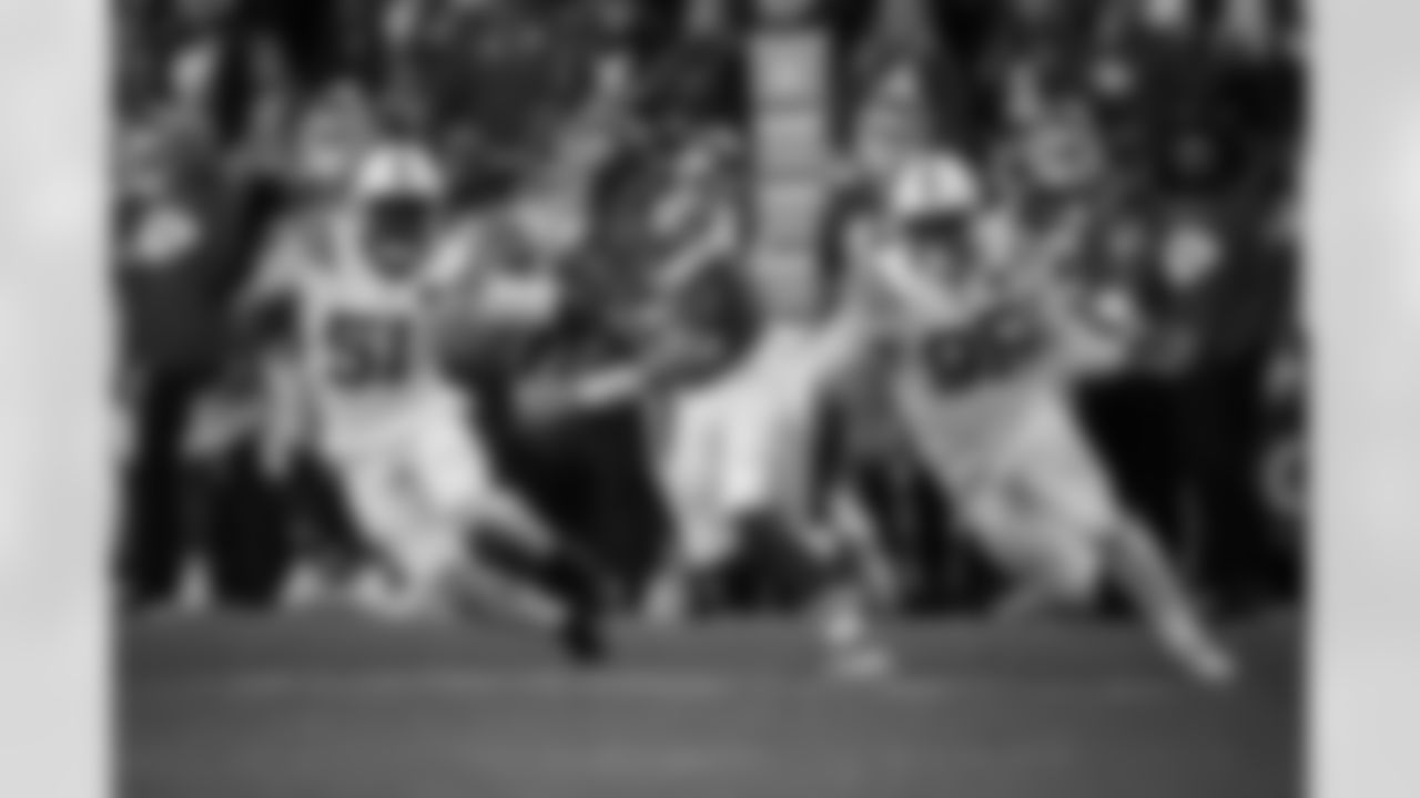 DE Kwity Paye #51 and DT Adetomiwa Adebawore #95