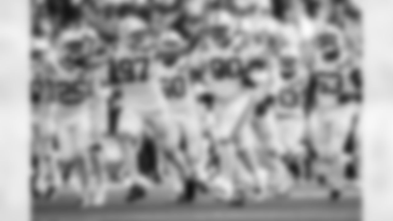 DE Laiatu Latu #97 and DT Grover Stewart #90