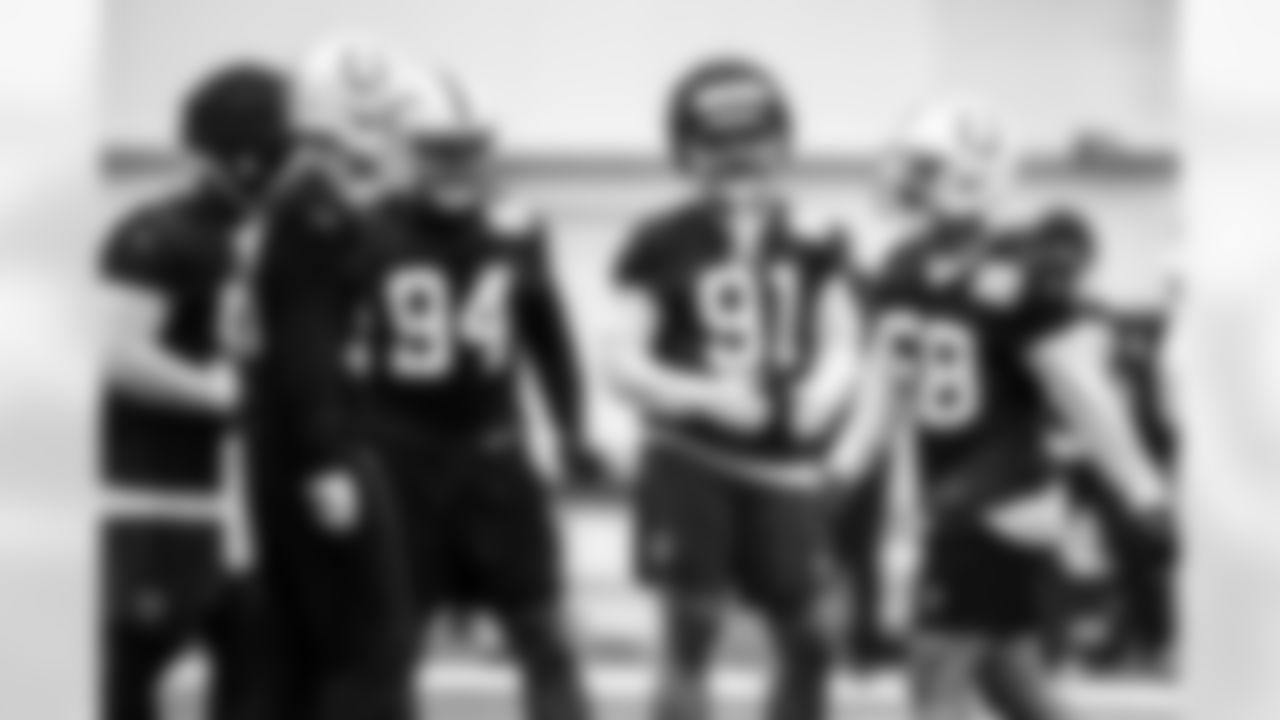 DE Tyquan Lewis #94, DE JT Tuimoloau #91 and LB Austin Ajiake #58