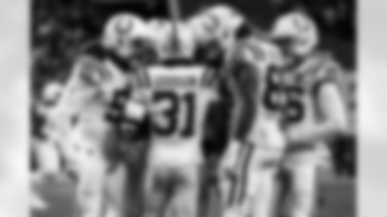 LB Segun Olubi #50, RB Tyler Goodson #31, TE Drew Ogletree #85 and S Rodney Thomas II #25