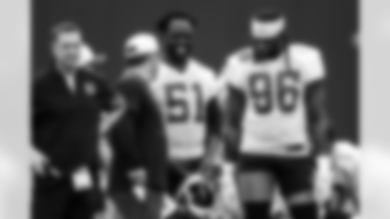 Lou Anarumo Defensive Coordinator, DE Kwity Paye #51 and DE Marcus Haynes #96