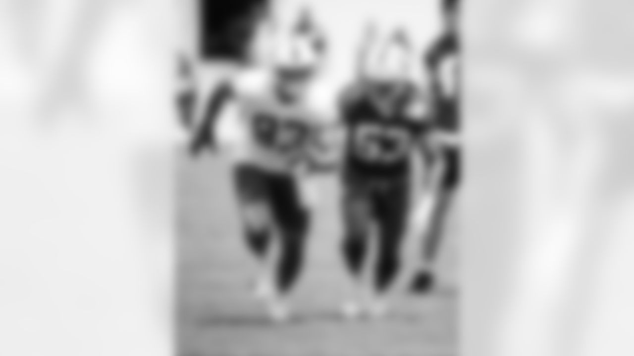 TE Albert Okwuegbunam Jr. #84 and LB Solomon DeShields #53