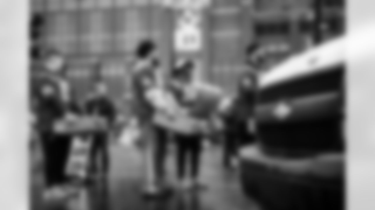 C Jimmy Morrissey #65, DE JT Tuimoloau #91 and DE Samson Ebukam #52