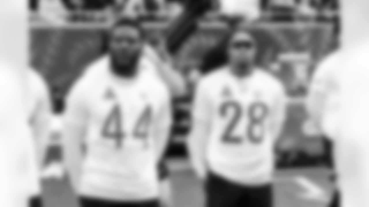 LB Zaire Franklin #44 and RB Jonathan Taylor #28