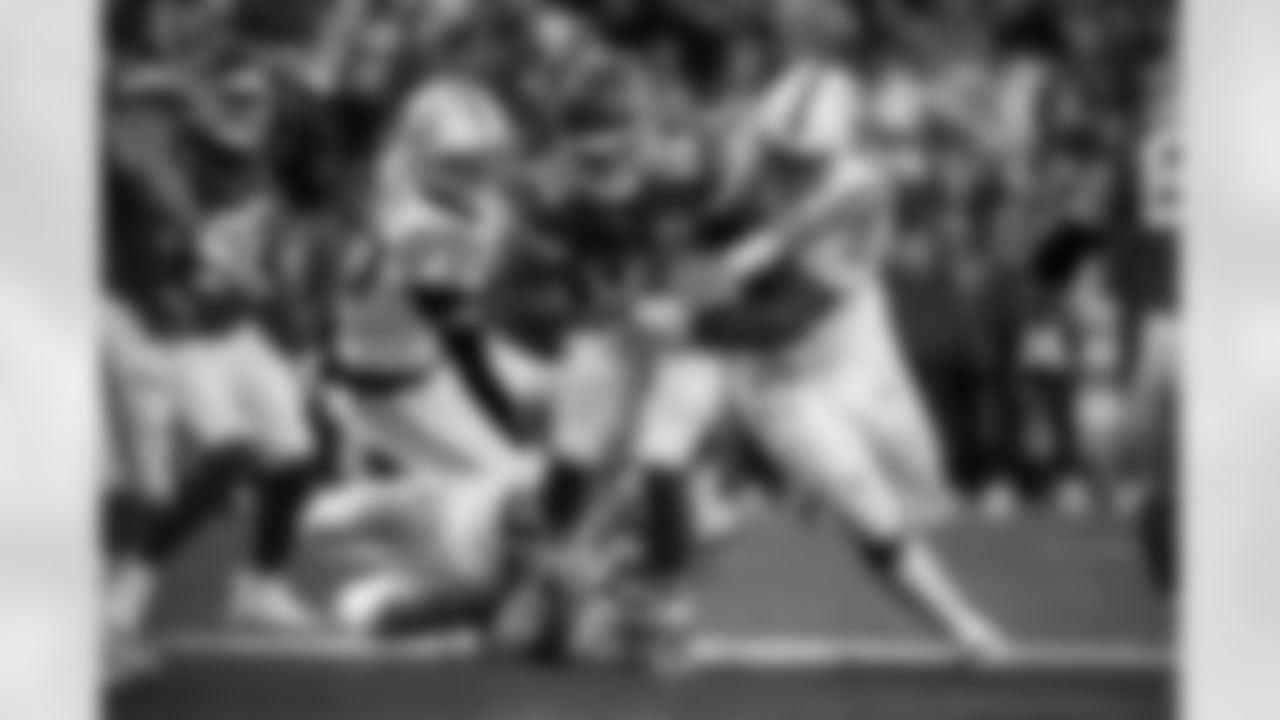 DE Laiatu Latu #97, DT Adetomiwa Adebawore #95 and DT Grover Stewart #90