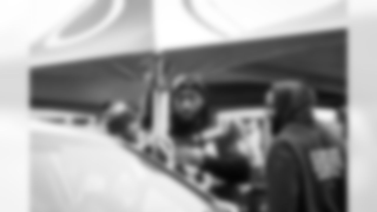 RB Jonathan Taylor #28, TE Mo Alie-Cox #81, LB Anthony Walker #54 and Kristin Ballard