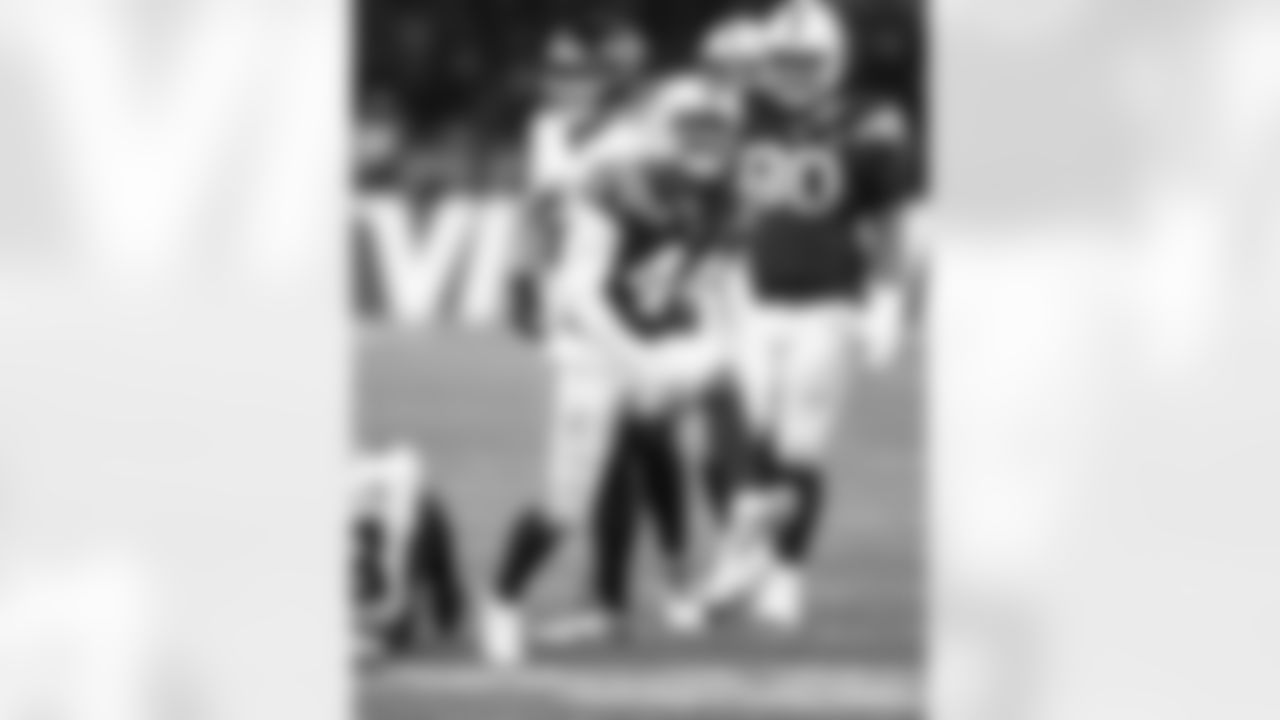 LB Zaire Franklin #44 and DT Grover Stewart #90