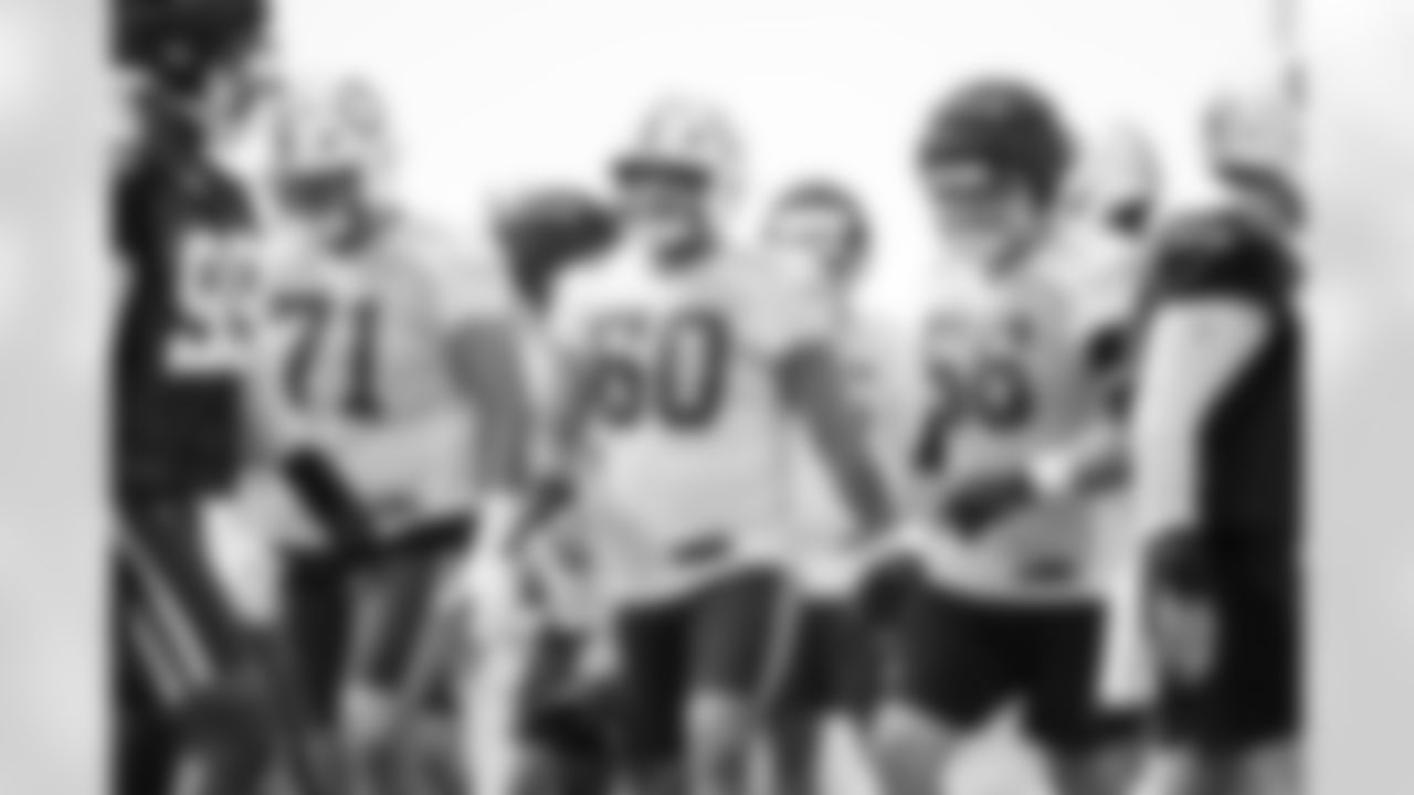 T Matt Goncalves #71, G Tanor Bortolini #60 and G Quenton Nelson #56