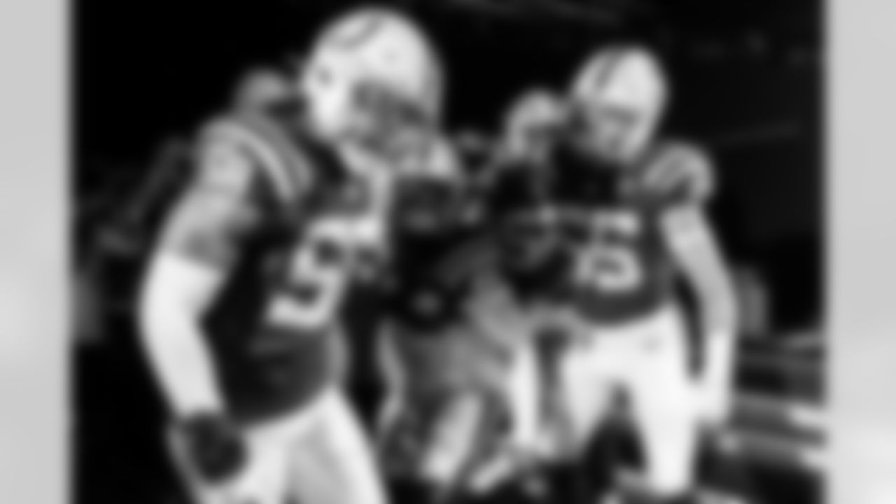 LB Austin Ajiake #58, LB Zaire Franklin #44 and LB Chad Muma #55