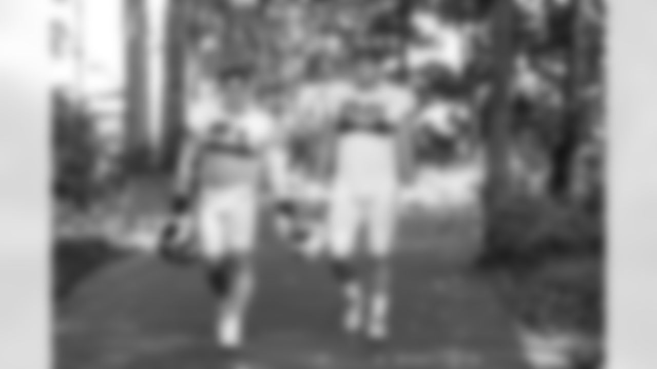 96 DT Taven Bryan, 61 DE Levi Bell
