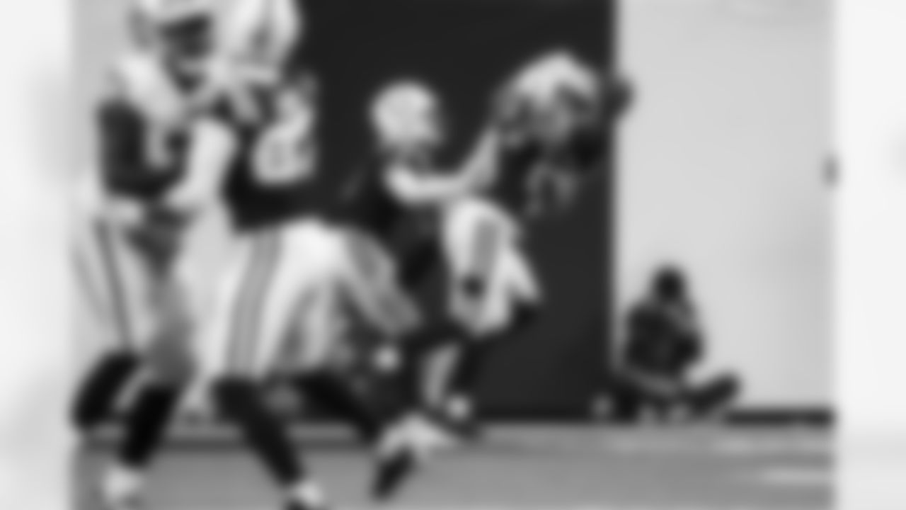 S Camryn Bynum #0 and S Nick Cross #20