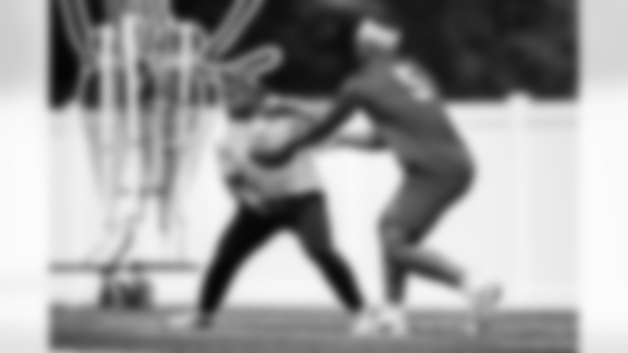 RB Khalil Herbert #26 and QB Anthony Richardson #5