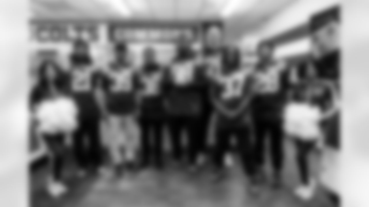 Victoria F., RB D.J. Giddens #21, CB David Long Jr. #39, RB Salvon Ahmed #36, DT Eric Johnson II #98, T Jack Wilson #76, RB Ulysses Bentley IV #37, RB Jonathan Taylor #28 and Jada W.