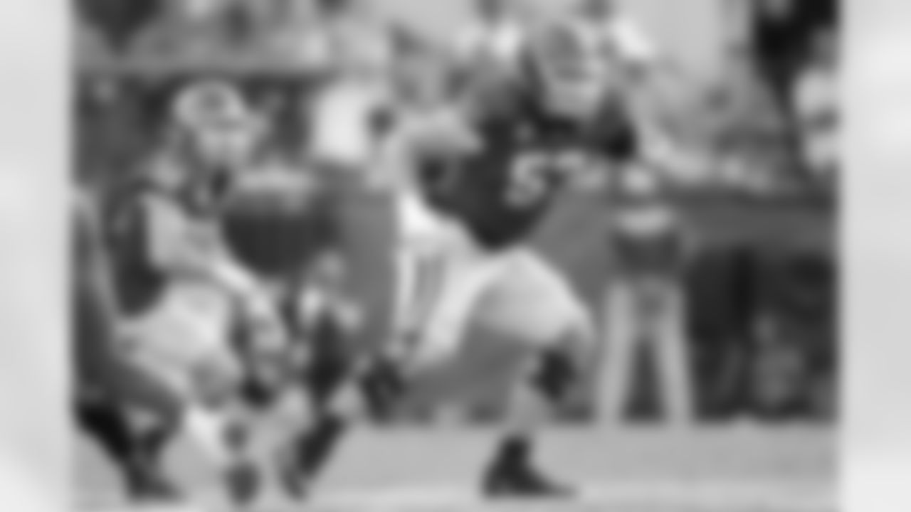 Georgia offensive lineman Monroe Freeling (57) sets up to block against Florida during the first half of an NCAA college football game, Saturday, Nov. 2, 2024, in Jacksonville, Fla. (AP Photo/Phelan M. Ebenhack)