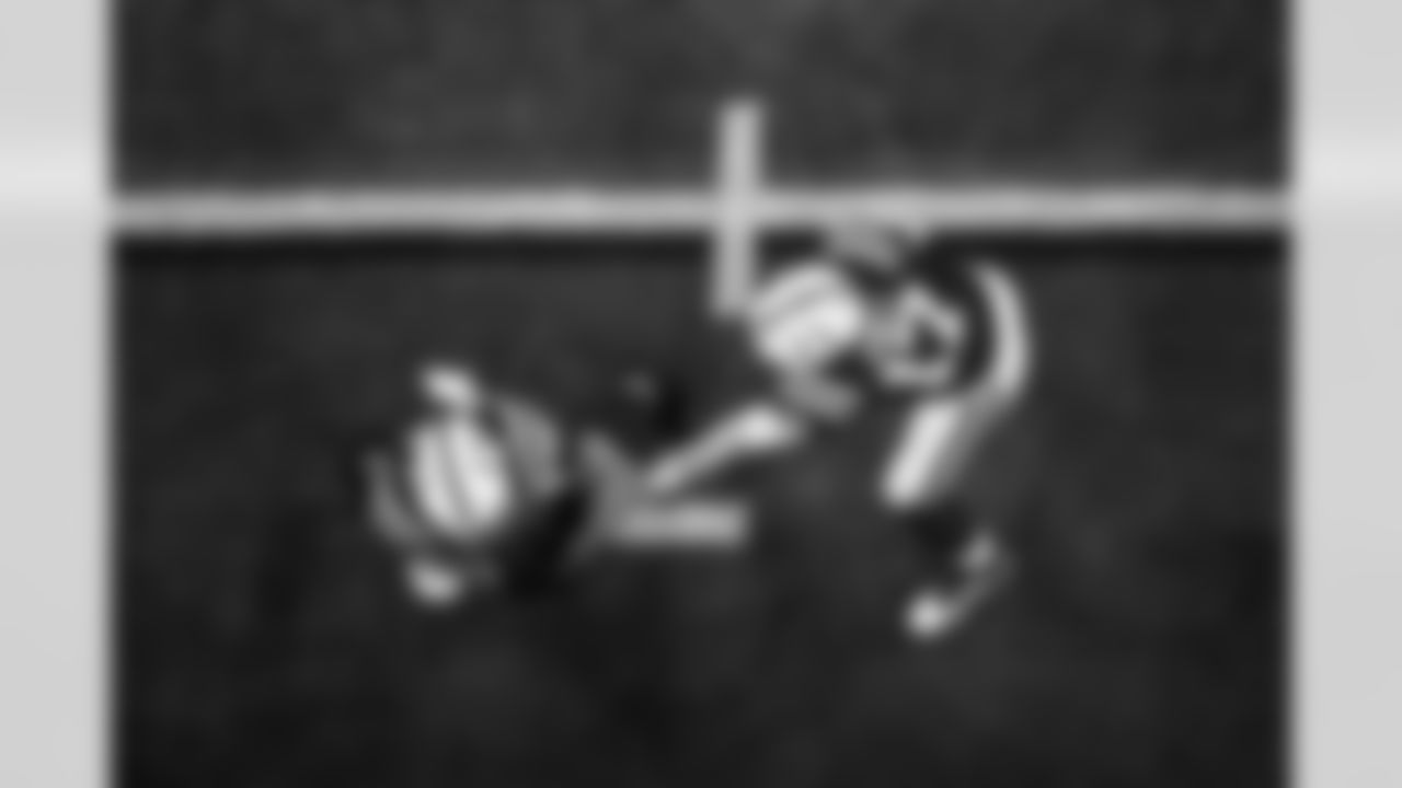 RB Jonathan Taylor #28 and QB Daniel Jones #17