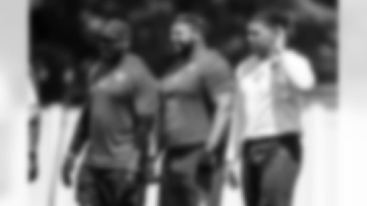 DE Tyquan Lewis #94, DT Grover Stewart #90 and TE Drew Ogletree #85