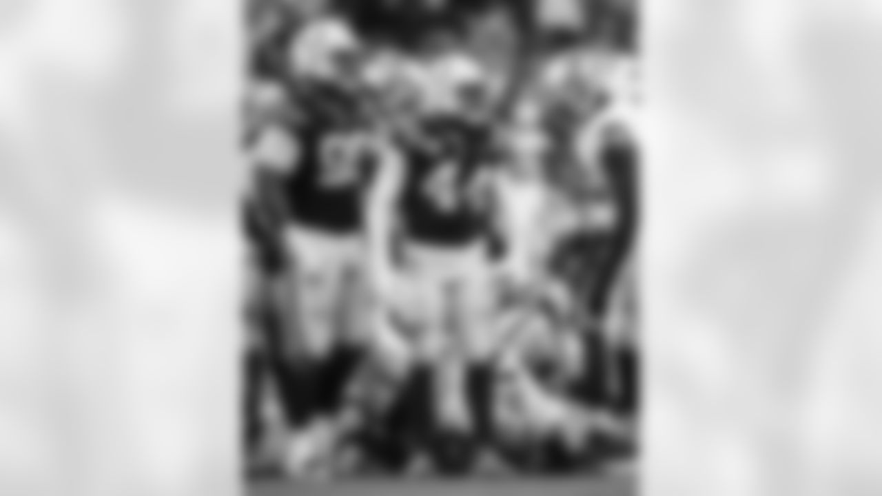 DT Grover Stewart #90 and LB Zaire Franklin #44