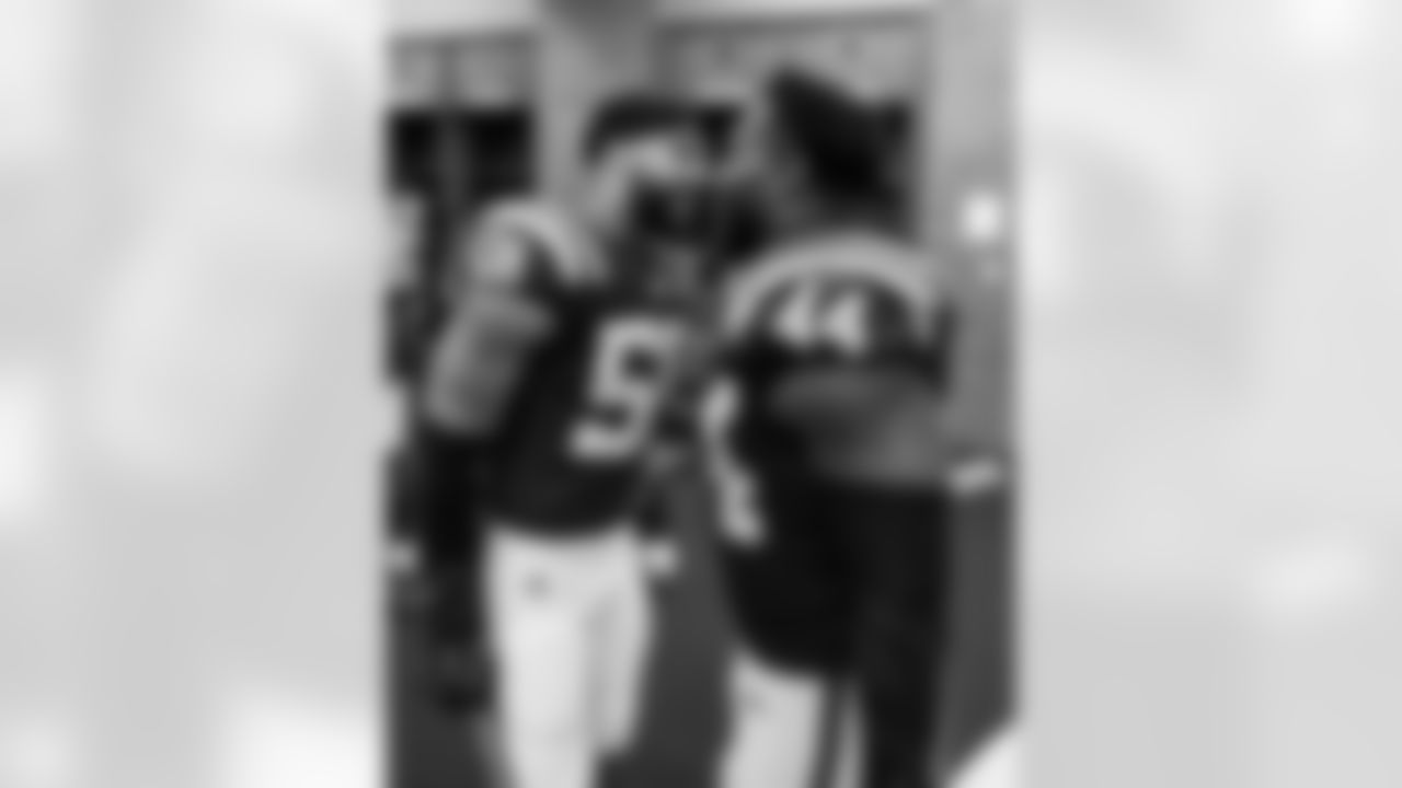 LB Austin Ajiake #58 and LB Zaire Franklin #44