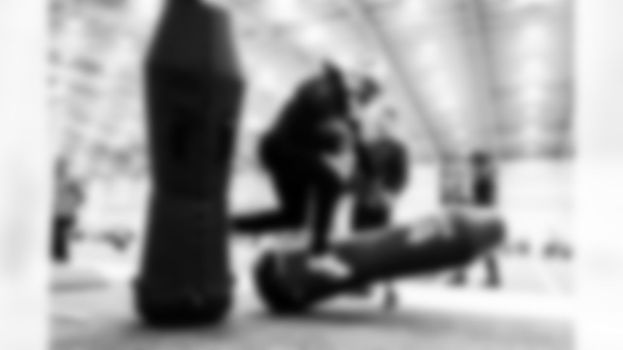 RB Tyler Goodson #31 and Brad Powers Equipment