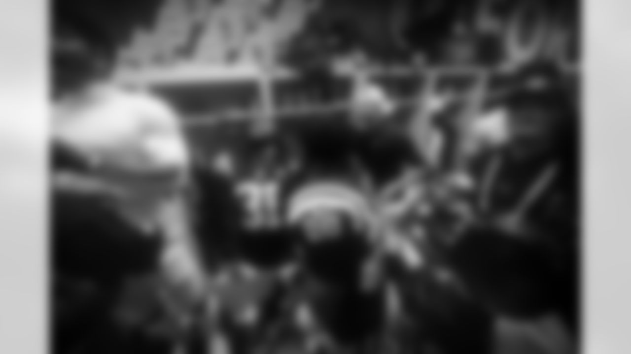 RB Tyler Goodson #31, QB Riley Leonard #15 and RB Jonathan Taylor #28