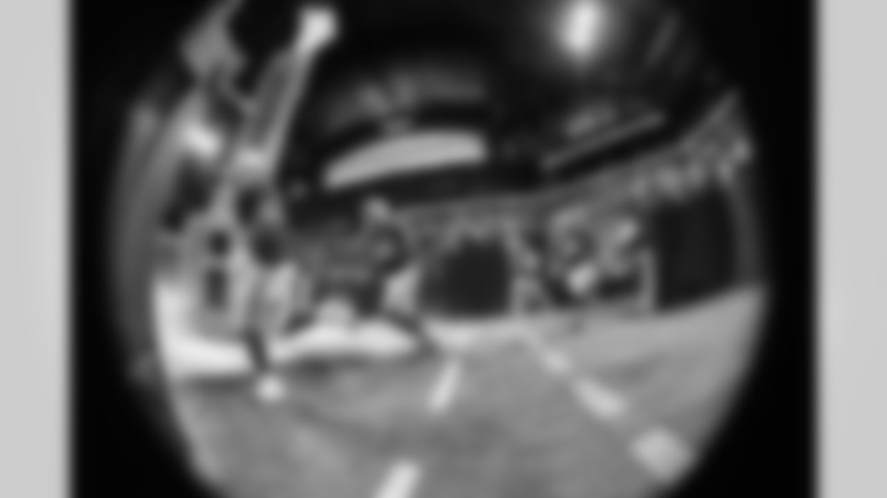 DE Tyquan Lewis #94 and DT Neville Gallimore #92