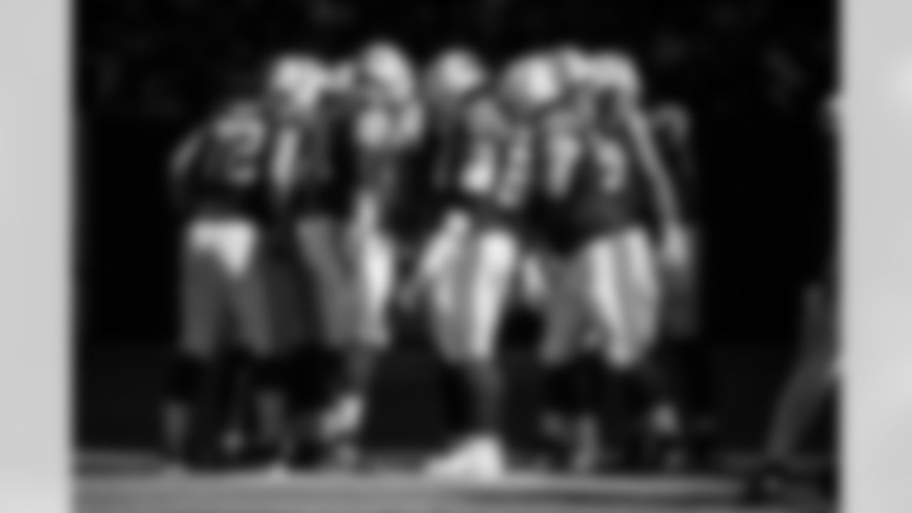 OL Braden Smith #72, OL Matt Goncalves #71, OL Tanor Bortolini #60 and OL Quenton Nelson #56