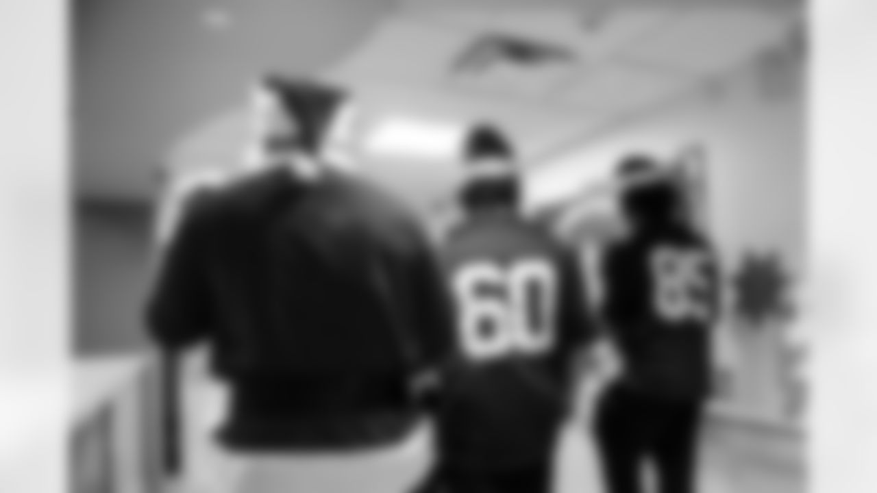 C Tanor Bortolini #60, TE Drew Ogletree #85 and G Dalton Tucker #68