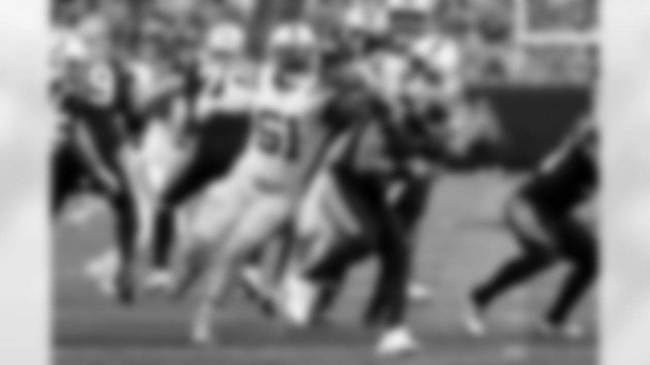 51 DE Kwity Paye, 93 DT Eric Johnson II