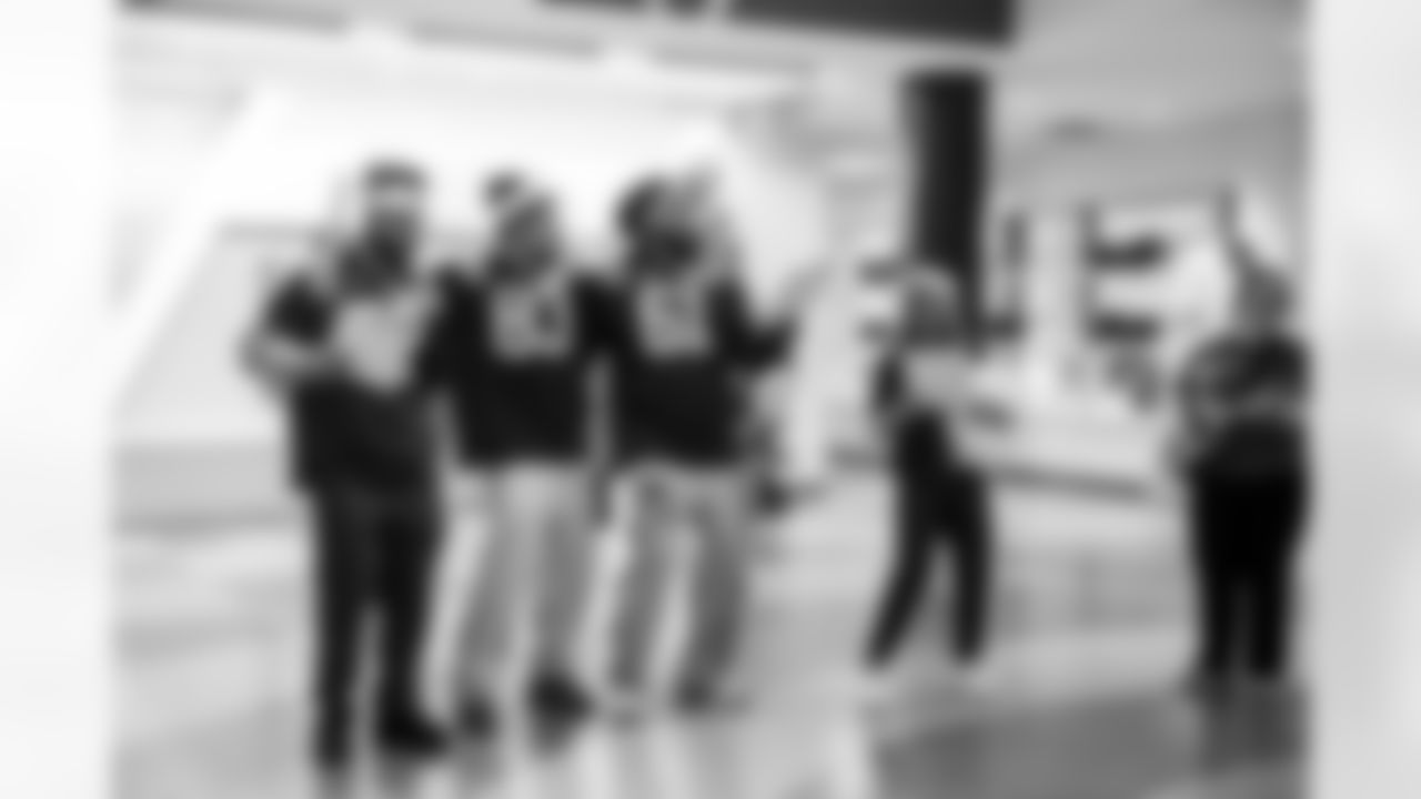 LB Austin Ajiake #58, WR Eli Pancol#83, DE Viliami Fehoko Jr.#61 and Allison B.