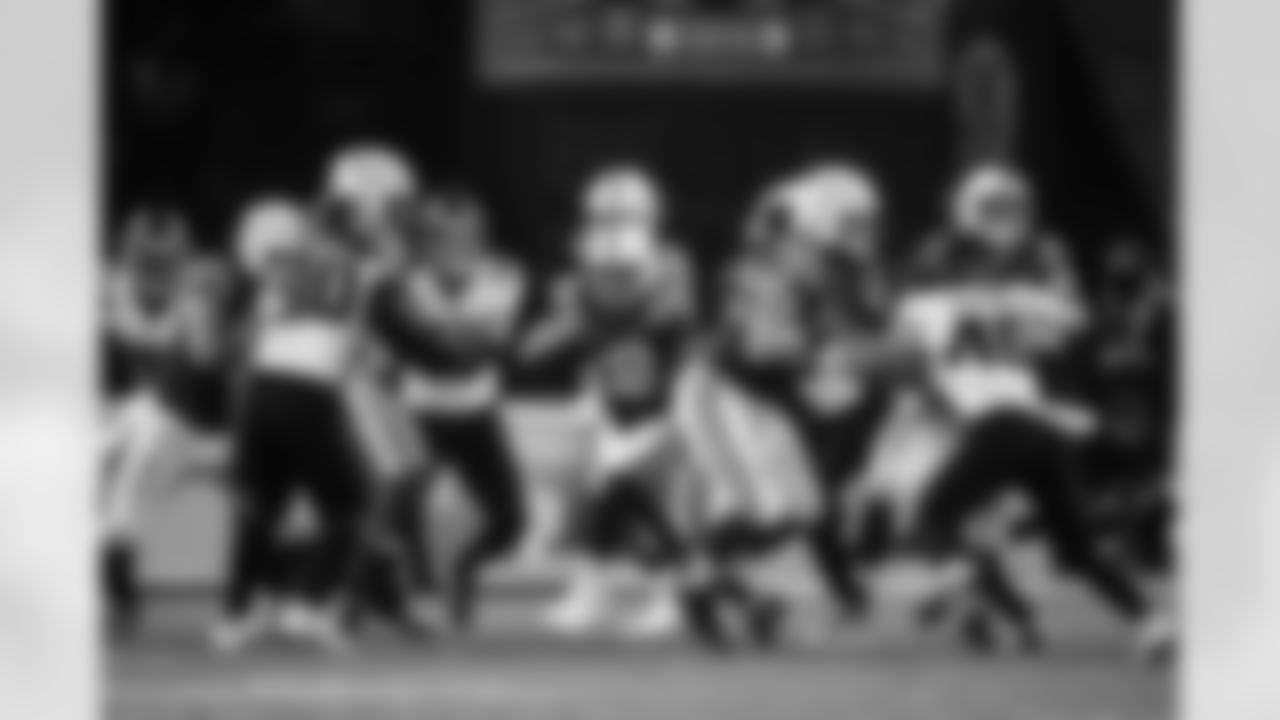 RB Jonathan Taylor #28, T Braden Smith #72 and G Quenton Nelson #56