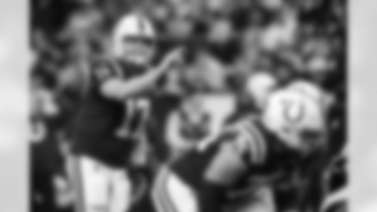 QB Philip Rivers #17 and T Jalen Travis #75