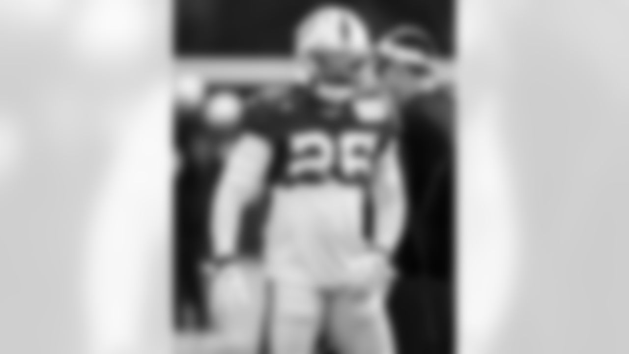 RB Ameer Abdullah #26 and Brad Powers Equipment