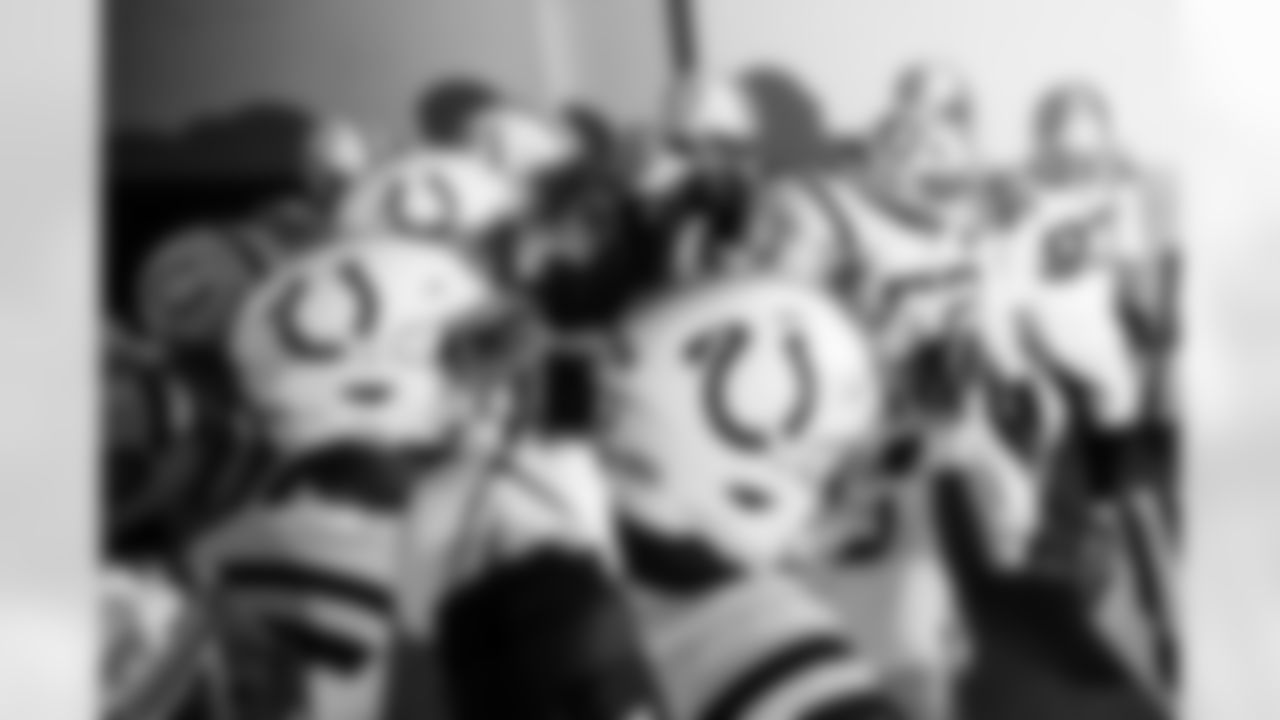 DE Tyquan Lewis #94 and DL Laiatu Latu #97