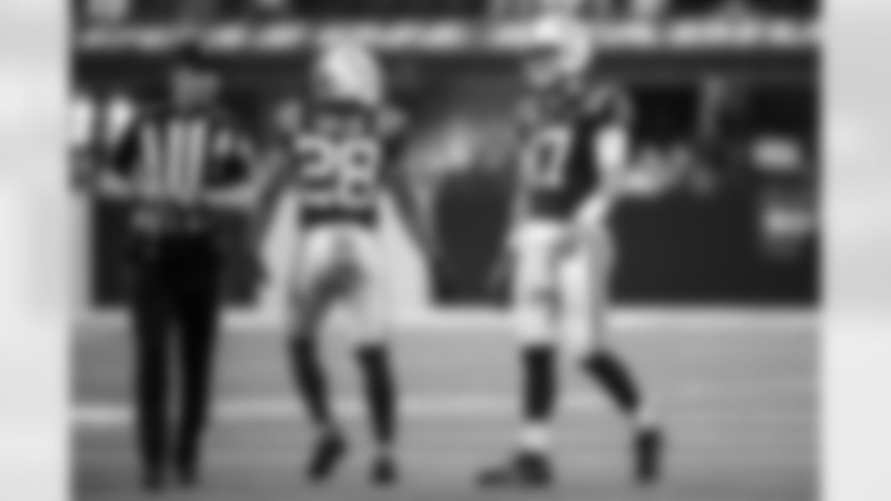 RB Jonathan Taylor #28 and QB Daniel Jones #17