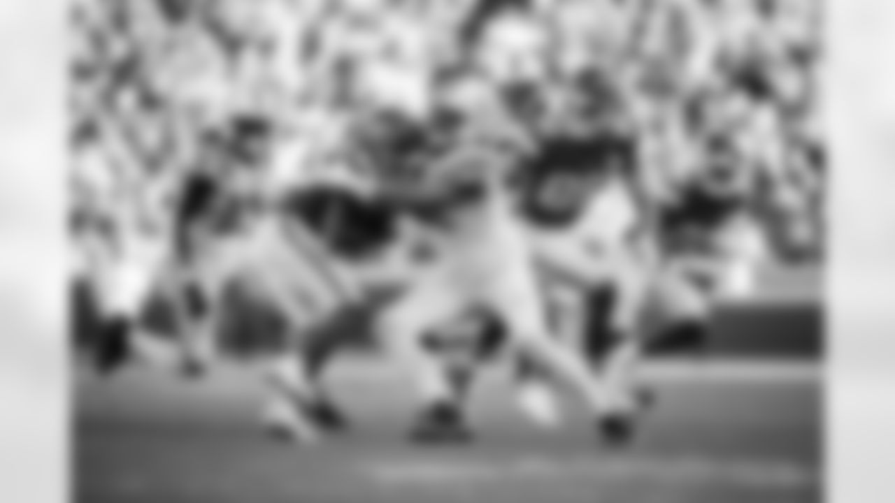 DE JT Tuimoloau #91 and T Blake Freeland #73