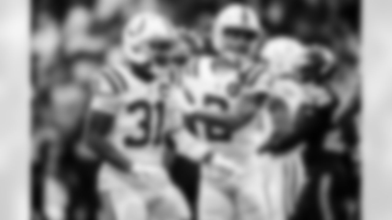 RB Tyler Goodson #31 and WR Josh Downs #2