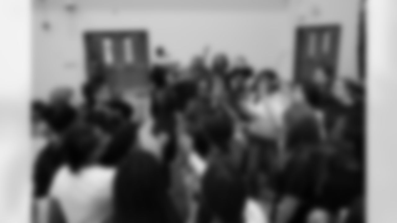 Students huddle up during a GENYOUth clinic on Tuesday, Feb. 24, 2026, at Fall Creek Valley Middle School in Indianapolis. (Jerod Ringwald/AP Content Services for the NFL)