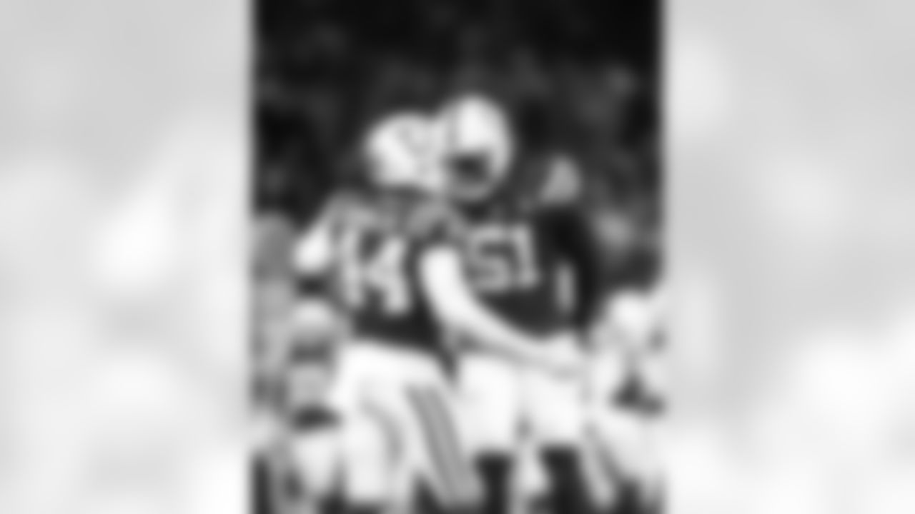 LB Zaire Franklin #44 and DE Kwity Paye #51