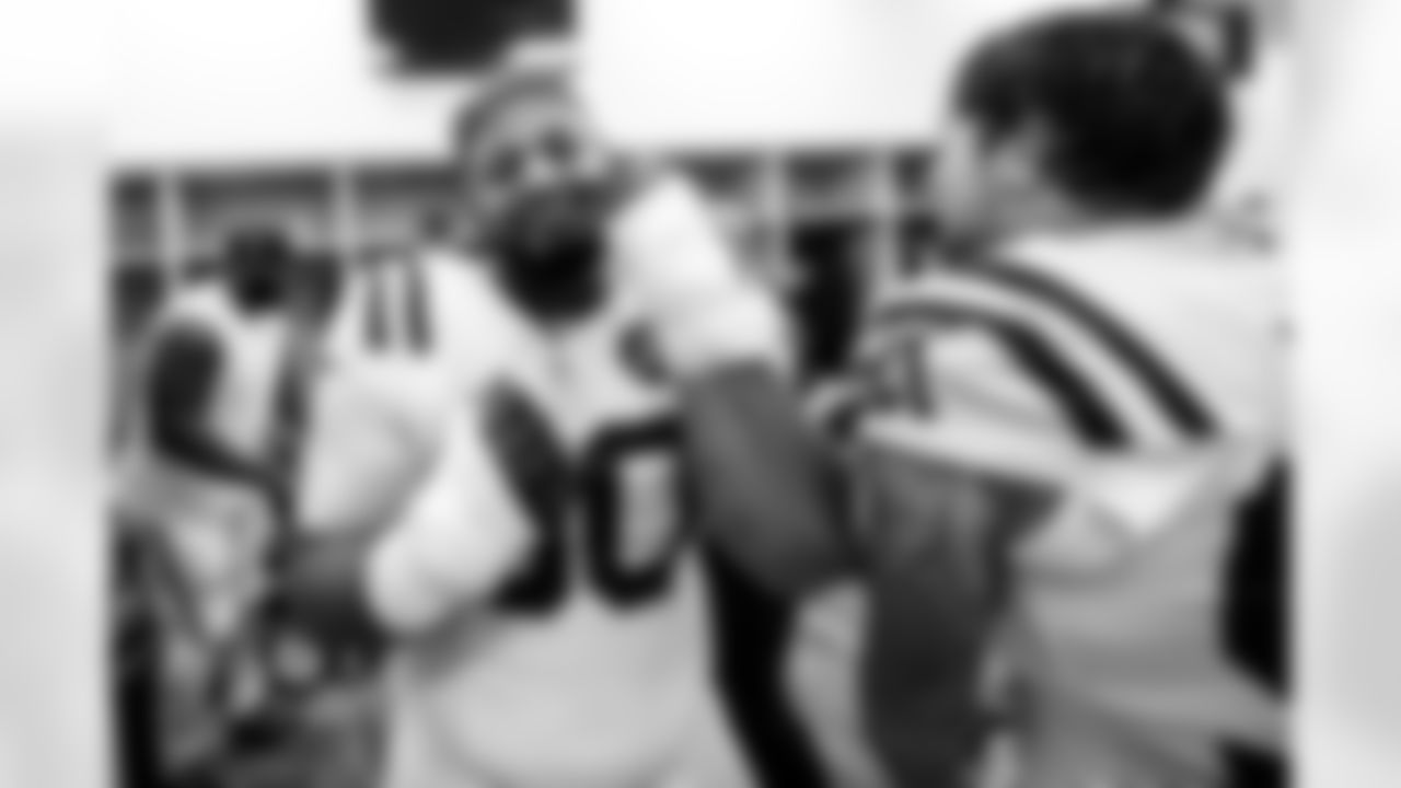 DT Neville Gallimore #92, DT Grover Stewart #90 and DE Laiatu Latu #97